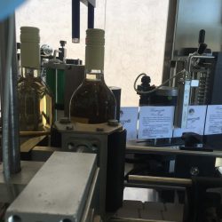 bottles getting corked at processing plant
