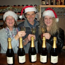 Ramazzotti staff in Santa hats with bottles