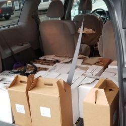 wine shipments boxed in trunk of car