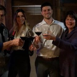 Travis, Norma and friends toasting